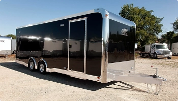 black enclosed car trailer parked outdoors showing secure transport option