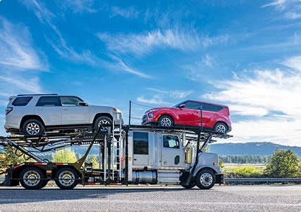 Multi Car Shipping Calculator Auto Transport Carrier multi car shipping calculator showing multiple vehicles loaded on an auto transport carrier