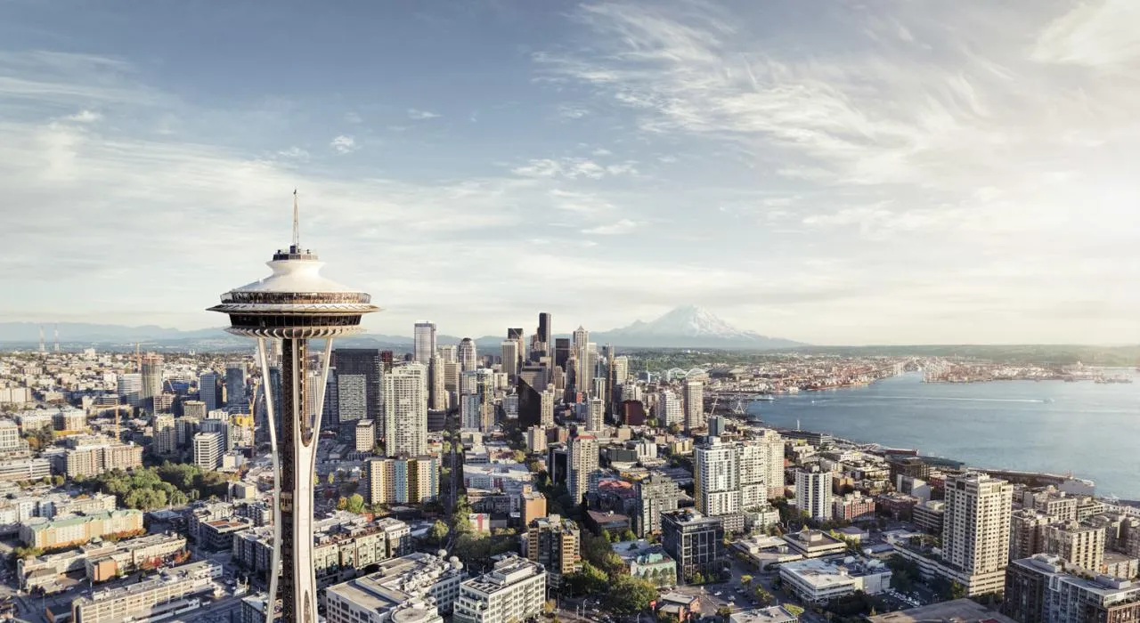 seattle skyline with the space needle, downtown buildings, and waterfront views