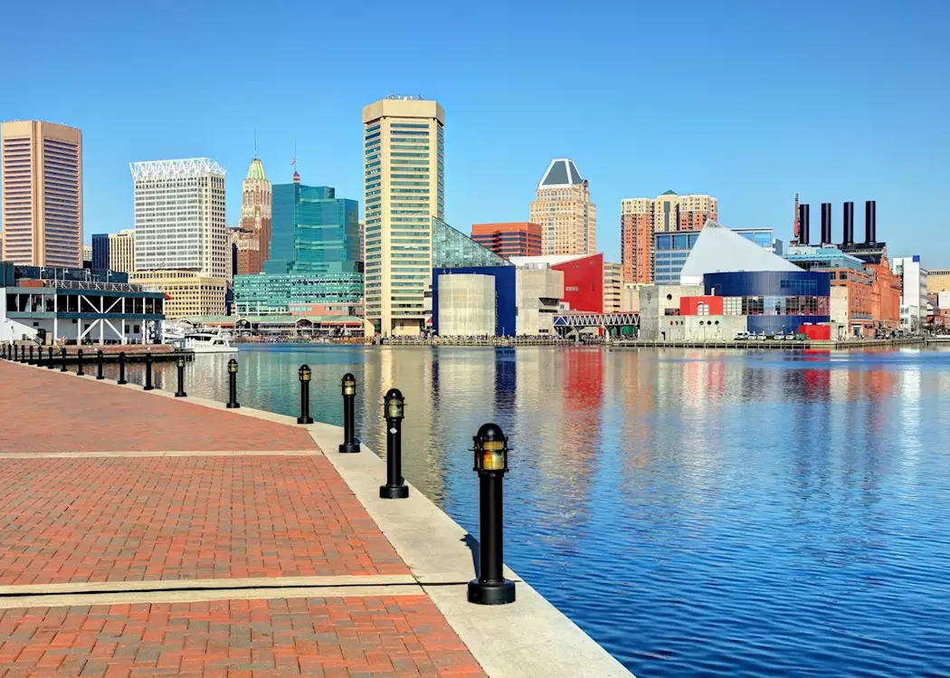 baltimore inner harbor skyline with waterfront promenade and downtown buildings